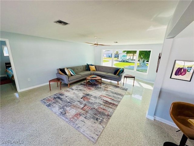 living room with ceiling fan