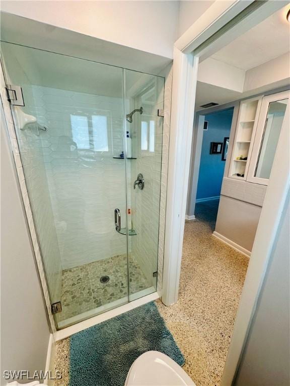 bathroom with an enclosed shower