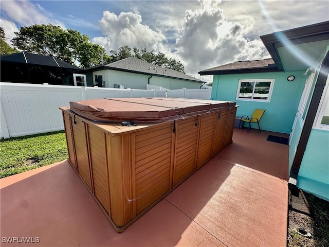 view of patio with a hot tub