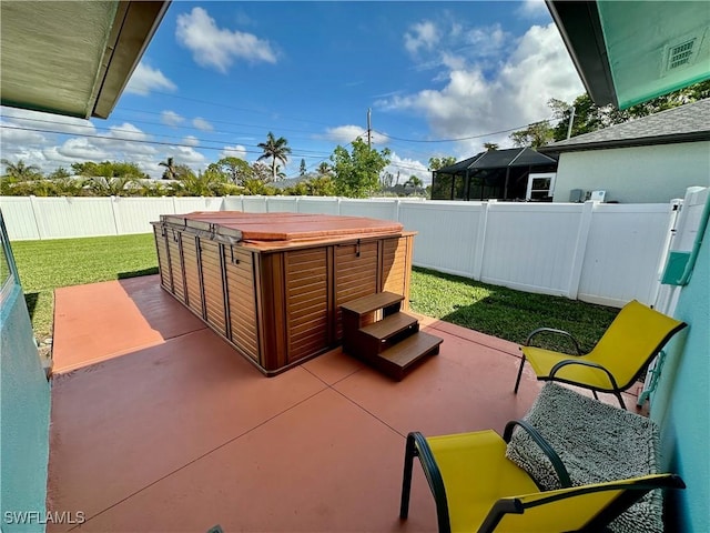 view of patio with a hot tub