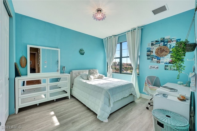 bedroom featuring hardwood / wood-style floors