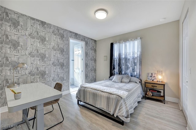 bedroom featuring light wood-type flooring