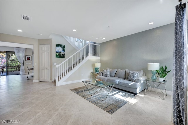 living room featuring light tile patterned floors