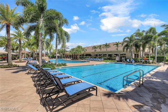 view of swimming pool featuring a patio area