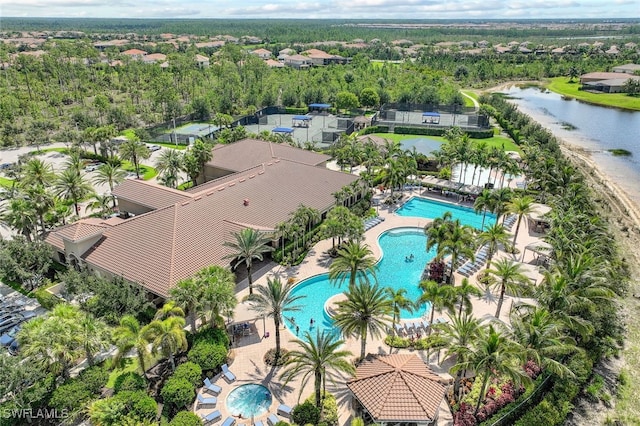 birds eye view of property featuring a water view