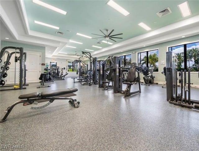 exercise room with ceiling fan