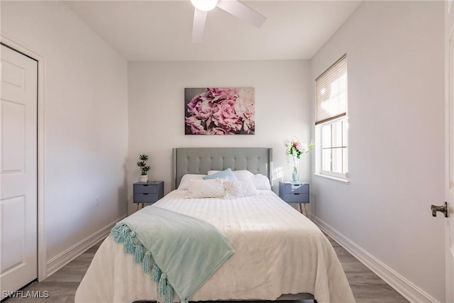 bedroom with wood-type flooring and ceiling fan