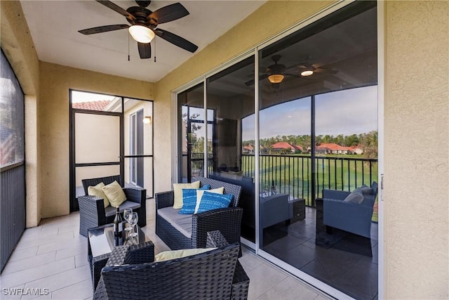 sunroom / solarium with ceiling fan