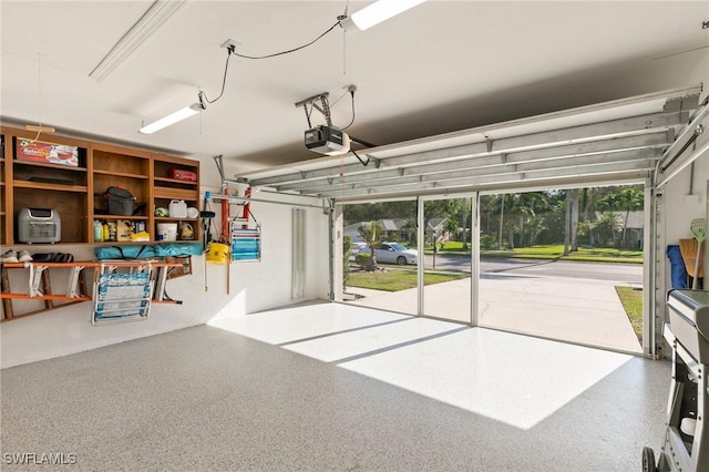 garage featuring a garage door opener