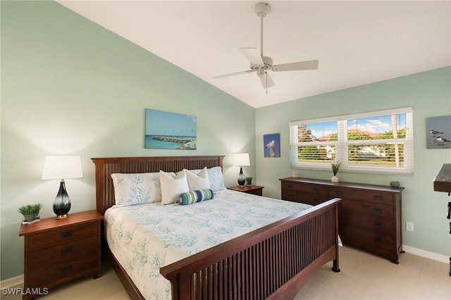 bedroom featuring ceiling fan and vaulted ceiling