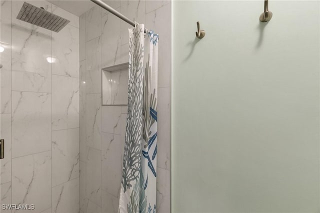 bathroom with a shower with shower curtain