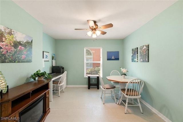 dining space with ceiling fan