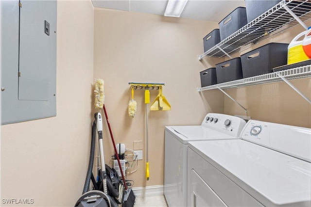 laundry area featuring washer and clothes dryer and electric panel