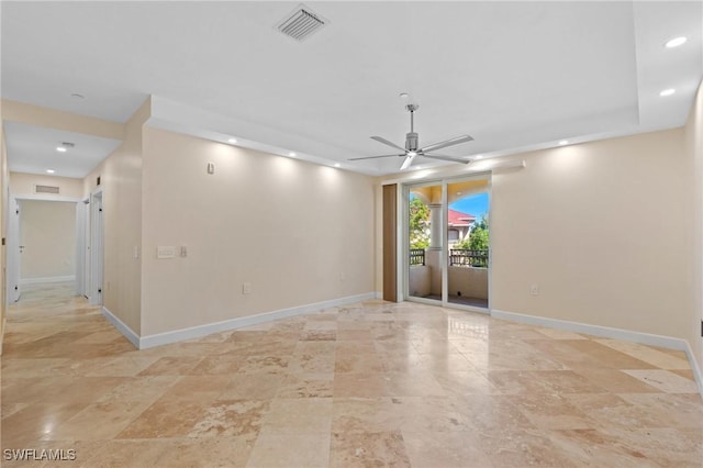 spare room with ceiling fan