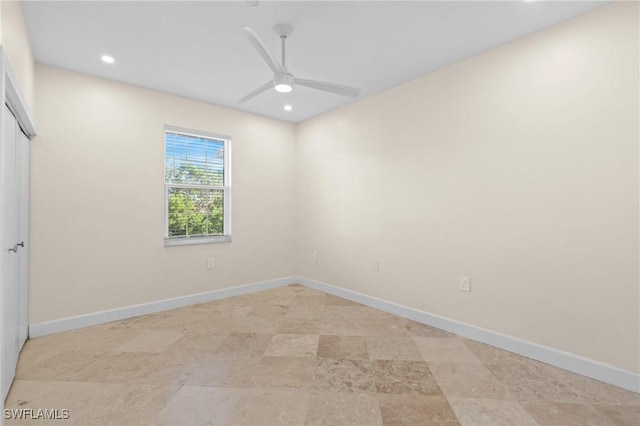 empty room featuring ceiling fan