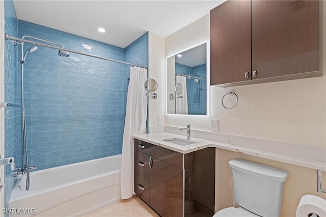 full bathroom with vanity, toilet, and shower / tub combo