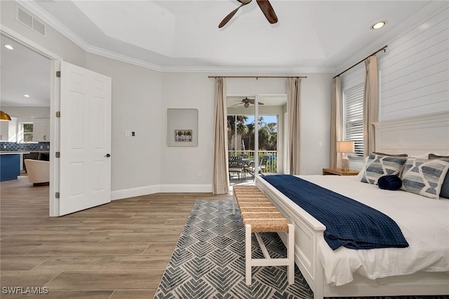 bedroom featuring access to outside, ceiling fan, hardwood / wood-style floors, and crown molding