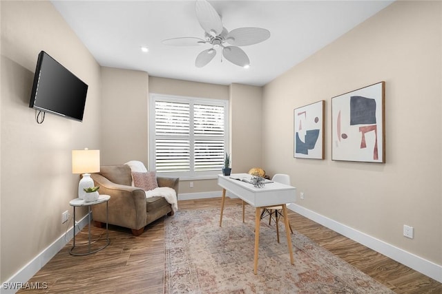 office area with ceiling fan and hardwood / wood-style flooring