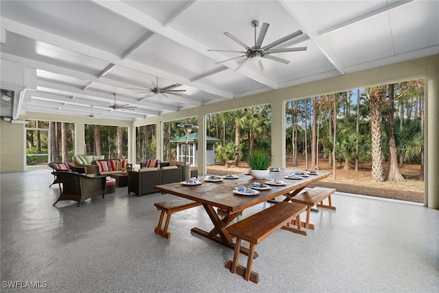 sunroom with beamed ceiling and coffered ceiling