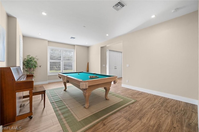 recreation room with pool table and light wood-type flooring