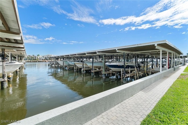 dock area featuring a water view and boat lift