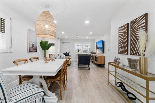 dining area with light wood-type flooring