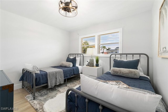 bedroom featuring light wood-type flooring