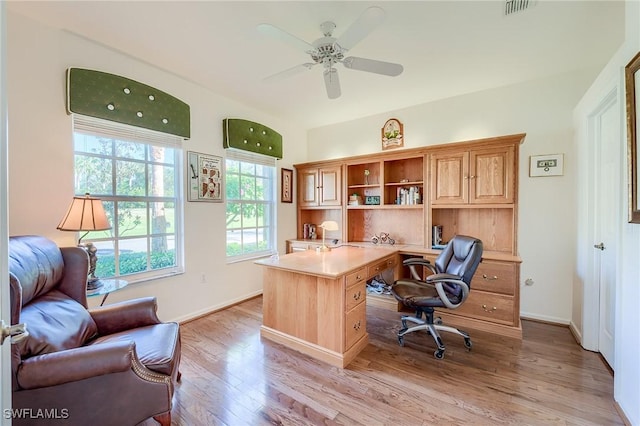 office featuring light wood-type flooring and ceiling fan