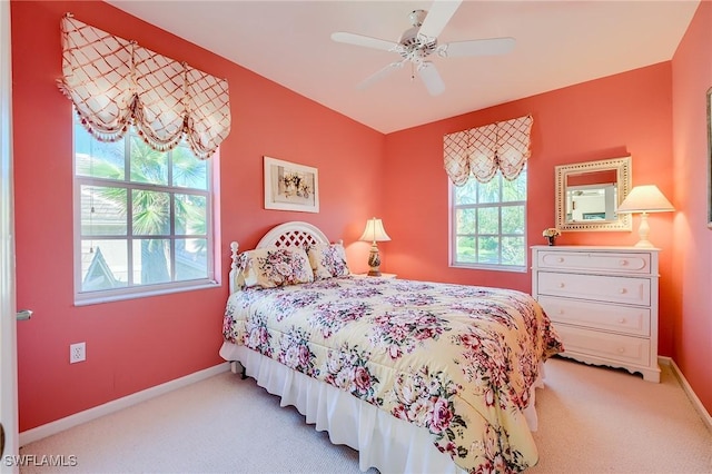 bedroom featuring ceiling fan and carpet floors