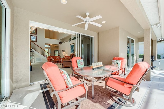 view of patio / terrace featuring ceiling fan