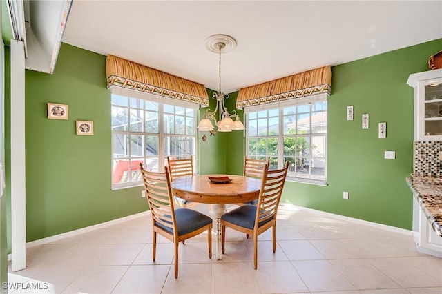 dining space with light tile patterned floors