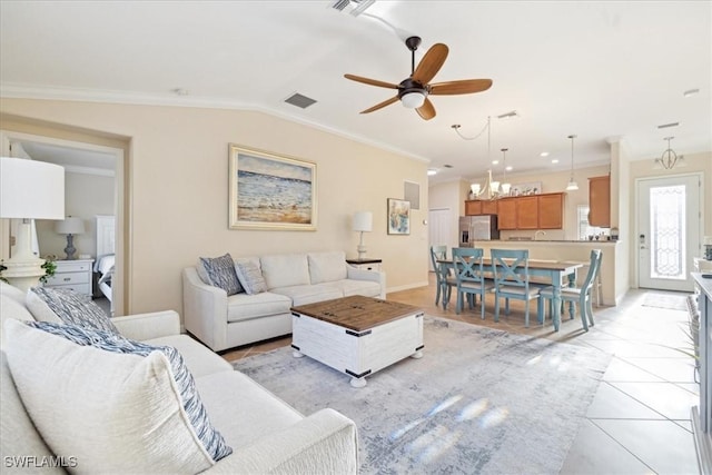 20680 Vita Ct, Venice, FL 34293 - living room featuring ceiling fan, a chandelier, ornamental molding, light tile patterned floors, and vaulted ceiling