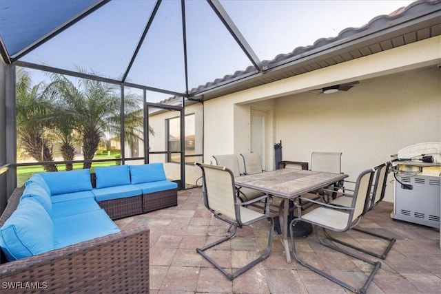 20680 Vita Ct, Venice, FL 34293 - view of patio / terrace featuring an outdoor living space, glass enclosure, outdoor dining space, and ceiling fan