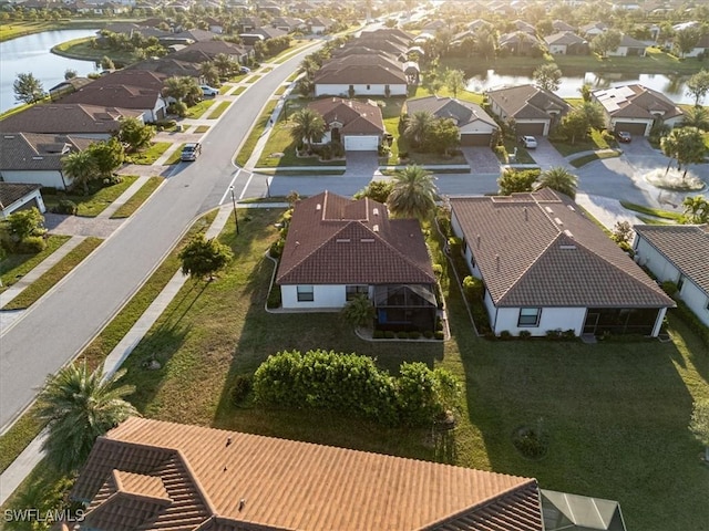 20680 Vita Ct, Venice, FL 34293 - aerial view of residential area with a large body of water