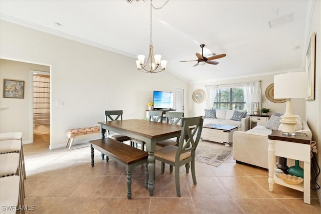 20680 Vita Ct, Venice, FL 34293 - dining area with a ceiling fan, crown molding, light tile patterned flooring, vaulted ceiling, and a chandelier