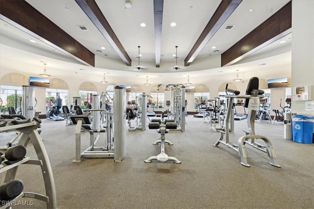 20680 Vita Ct, Venice, FL 34293 - gym featuring beamed ceiling, recessed lighting, and healthy amount of natural light