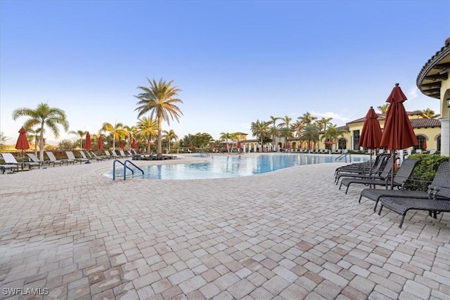 20680 Vita Ct, Venice, FL 34293 - community pool with a patio area