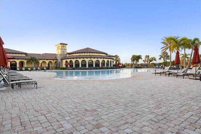 20680 Vita Ct, Venice, FL 34293 - community pool featuring a patio