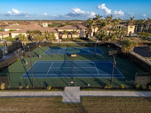 20680 Vita Ct, Venice, FL 34293 - view of tennis court featuring a residential view