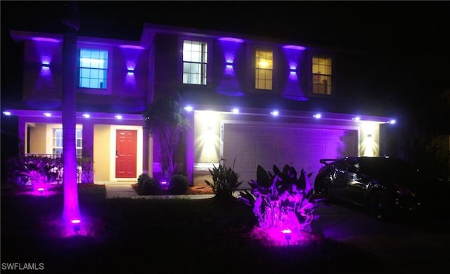 view of front of house with a garage