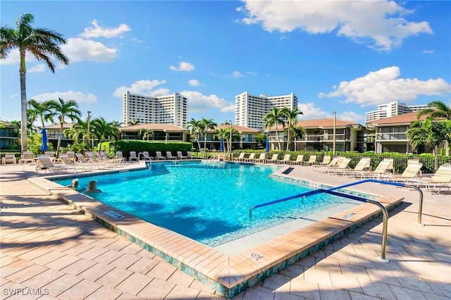 view of pool featuring a patio area