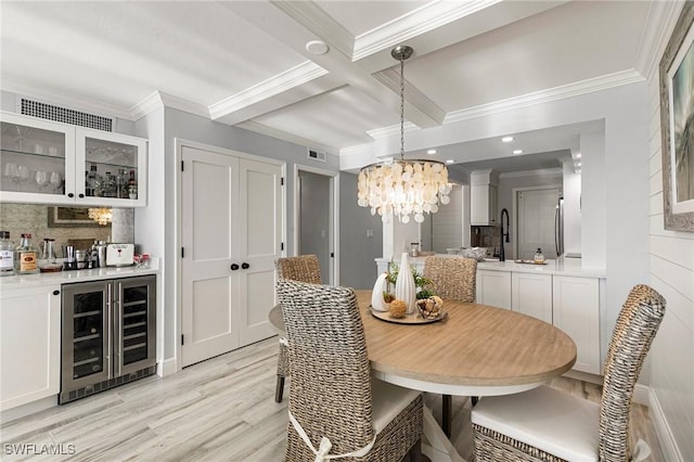 dining space featuring ornamental molding, coffered ceiling, beamed ceiling, light hardwood / wood-style floors, and wine cooler