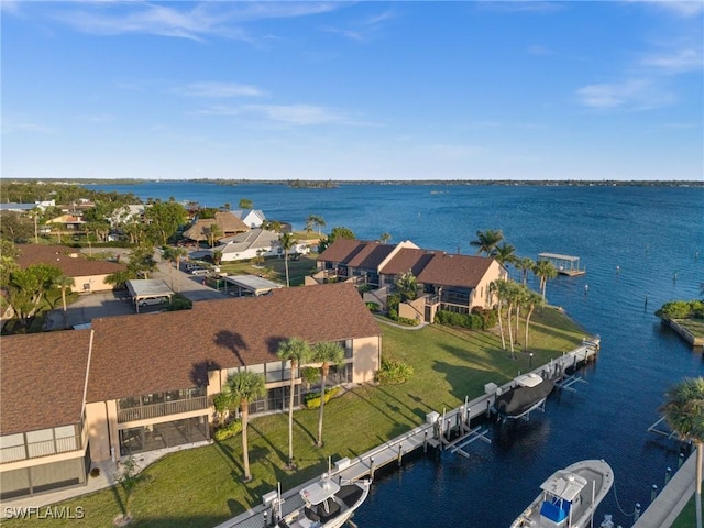 drone / aerial view with a water view