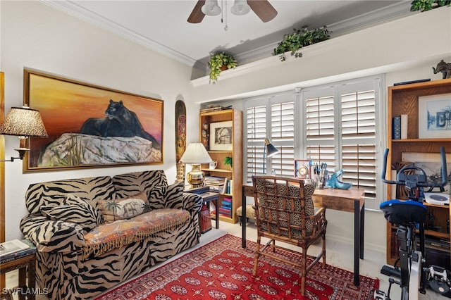 office area with a ceiling fan and crown molding