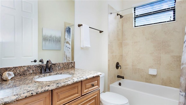 full bathroom with vanity, toilet, and shower / bath combo with shower curtain