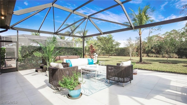 view of patio with outdoor lounge area and glass enclosure