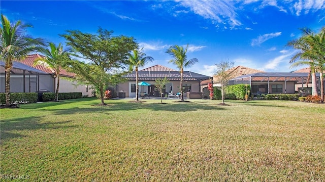 view of yard featuring a lanai