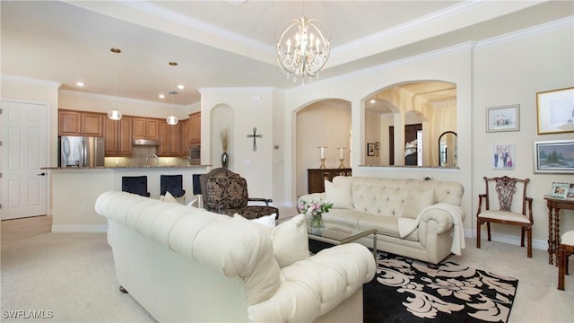 living room featuring a chandelier, light carpet, and crown molding