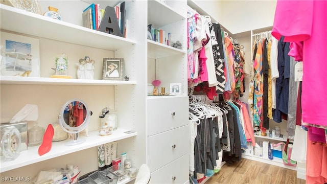 spacious closet featuring light wood-type flooring