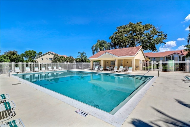 view of pool featuring a patio area